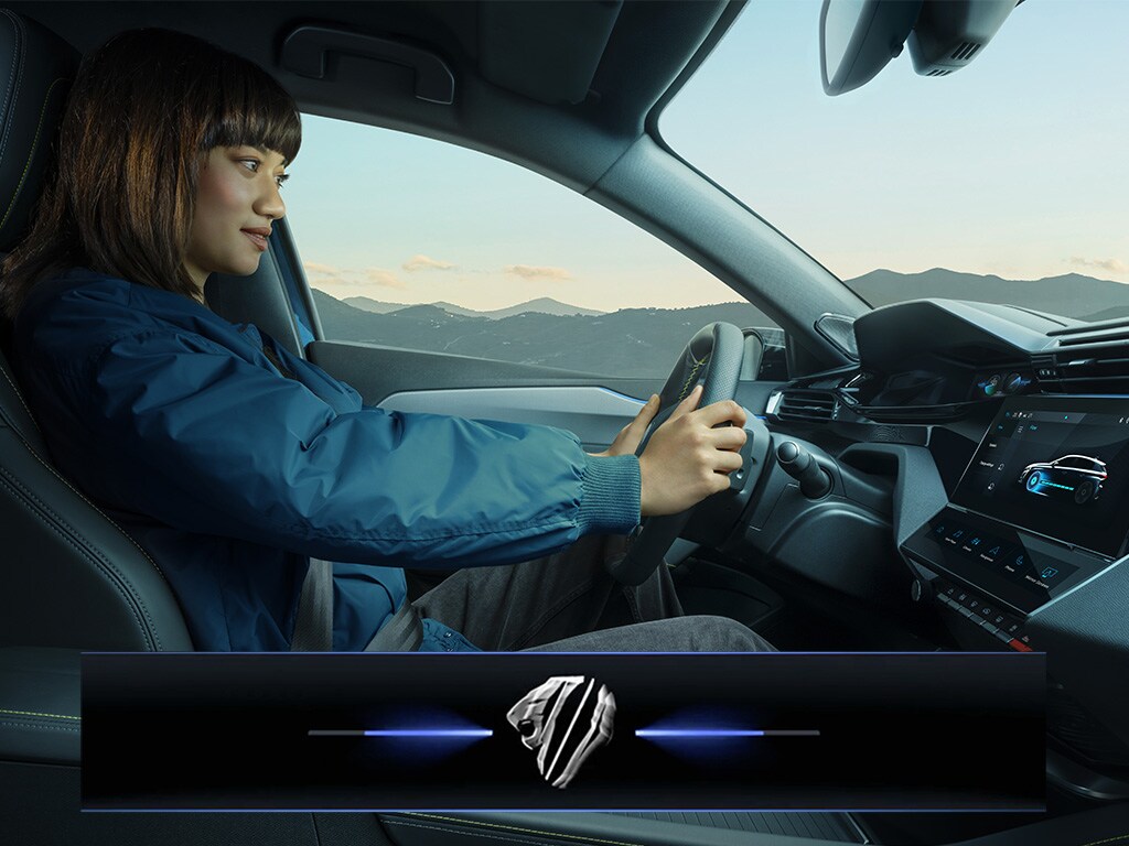 PEUGEOT E-308 i-Cockpit met vrouwelijke bestuurder